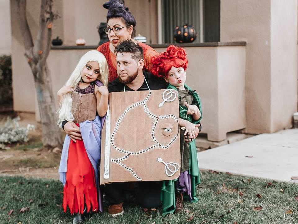 Family of four in a Hocus Pocus costume
